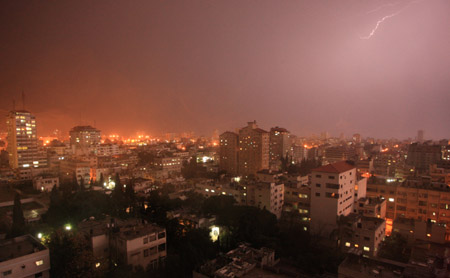 Lightning flashes above Gaza city as the first rain of this year starts to fall on February 10, 2009. 