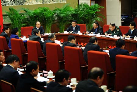 Chinese Premier Wen Jiabao presides over a forum to get suggestions to improve the government work report from leaders of non-communist parties, All-China Federation of Industry and Commerce, and public figures without party affiliation, in Beijing, capital of China, on February 9, 2009.