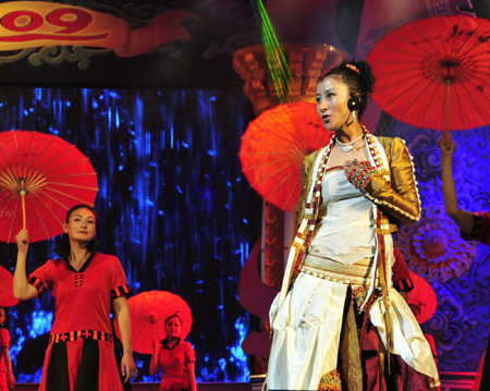 A singer presents a song during a rehearsal for the grand party scheduled to open on February 24 to celebrate the upcoming Tibetan New Year, the year of Ox, in Lhasa, capital of sotuhwest China's Tibet Autonomous Region, on February 14, 2009. 