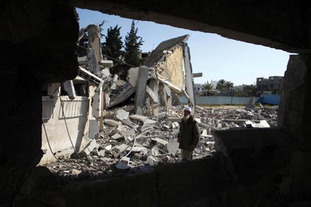 A Palestinian man stands in front of a destroyed mosque in the southern Gaza Strip town of Khan Younis on February 18, 2009. Israeli war jets struck a few targets in southern Gaza Strip on Wednesday. Severe destruction were caused, no injuries reported, witnesses said.