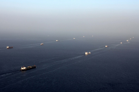 Photo taken on February 17, 2009 shows the grand view of the merchant vessels escorted by the Chinese naval fleet in the Gulf of Aden. 