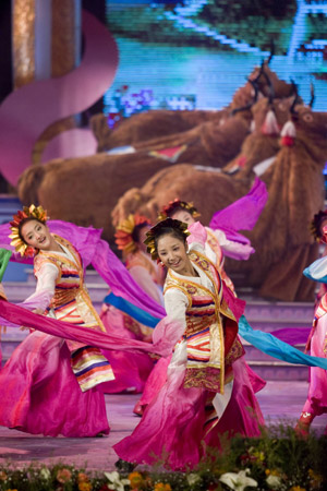 Tibetan artists in traditional costumes perform dance at a gala to celebrate the Tibetan New Year in Lhasa, capital of southwest China's Tibet Autonomous Region, on February 18, 2009. 