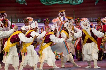 Tibetan artists perform dance at a gala to celebrate the Tibetan New Year in Lhasa, capital of southwest China's Tibet Autonomous Region, on February 18, 2009. 