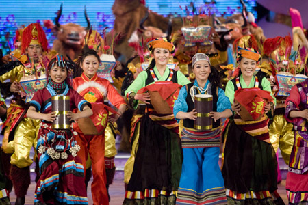 Tibetan artists perform dance at a gala to celebrate the Tibetan New Year in Lhasa, capital of southwest China's Tibet Autonomous Region, on February 18, 2009. 