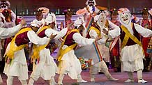 Tibetan artists perform dance at a gala to celebrate the Tibetan New Year in Lhasa, capital of southwest China's Tibet Autonomous Region, on February 18, 2009.