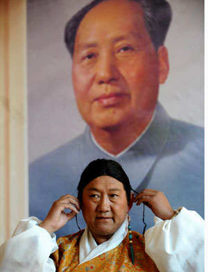 An artist from the Tibetan Drama Troupe of Tibet prepares for a performance to celebrate the upcoming Tibetan New Year in Ngaqen Village of Lhasa, Tibet Autonomous Region, on February 20, 2009. 