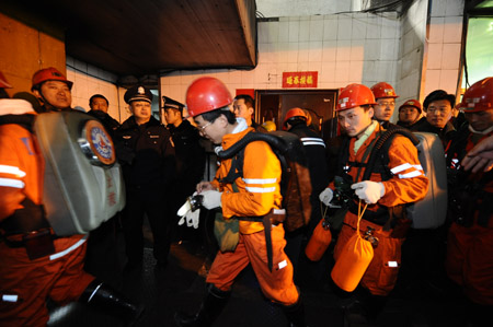 Rescue workers prepare to get into the coal mine to look for survivors in north China's Shanxi Province, on February 22, 2009. More than 40 miners have died after a coal mine blast occurred at about 2:00 AM on Sunday at the Tunlan Coal Mine of Shanxi Coking Coal Group in Gujiao City near Taiyuan, capital of north China's Shanxi Province, while rescuers are pulling out the trapped from the shaft, according to a rescuer at the site.