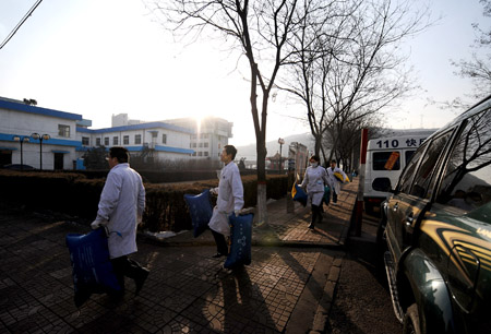 Medical workers prepare to treat survivors in north China&apos;s Shanxi Province, on February 22, 2009. More than 40 miners have died after a coal mine blast occurred at about 2:00 AM on Sunday at the Tunlan Coal Mine of Shanxi Coking Coal Group in Gujiao City near Taiyuan, capital of north China&apos;s Shanxi Province, while rescuers are pulling out the trapped from the shaft, according to a rescuer at the site. 