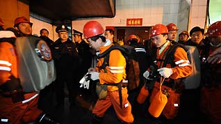 Rescue workers prepare to get into the coal mine to look for survivors in north China's Shanxi Province, on February 22, 2009. More than 40 miners have died after a coal mine blast occurred at about 2:00 AM on Sunday at the Tunlan Coal Mine of Shanxi Coking Coal Group in Gujiao City near Taiyuan, capital of north China's Shanxi Province, while rescuers are pulling out the trapped from the shaft, according to a rescuer at the site.