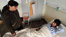 A miner injured in the accident rests in a hospital in north China's Shanxi Province on February 23, 2009. The death toll of the coal mine blast rose to 74 as of 6:00 PM on Sunday after one body was retrieved from the shaft, the rescue headquarters said.