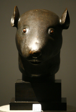 The bronze rat head is displayed during the exhibition of the private art collection of French fashion designer Yves Saint Laurent and his partner Pierre Berge at the Grand Palais in Paris on February 21, 2009.