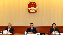 Wu Bangguo (C), chairman of the Standing Committee of the National People's Congress (NPC), presides over the seventh meeting of the 11th NPC Standing Committee in Beijing, capital of China, on February 25, 2009.