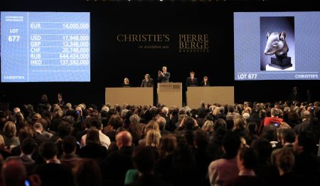 The bronze sculpture of a rat's head, which is an ancient Chinese relic, is auctioned in the Grand Palace of Paris in Paris, France, on February 25, 2009. Two controversial ancient Chinese relics including the bronze sculptures of a rat's head and a rabbit's head, were auctioned off on Wednesday night for 14 million euros each by anonymous telephone bidders in Christies's sale of the collection of Yves Saint Laurant and Pierre Berge in Paris. 