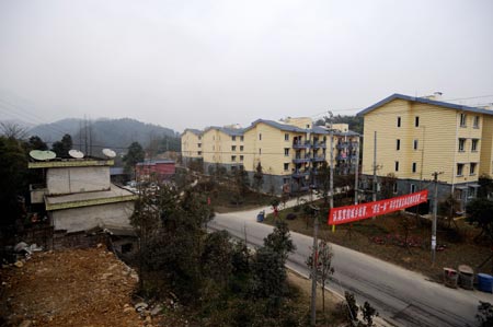 Photo taken on February 25, 2009 shows a view of Shibei New Village of Xiang'e Township in Dujiangyan City of southwest China's Sichuan Province. Sichuan Province speed up the construction of permanent housing with 85,800 houses and 1,143,000 rural habitats being built, respectively 27.37 percent and 90.5 percent of the restoration plan.