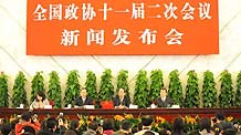 Zhao Qizheng (2nd R), spokesman of the Second Session of the 11th Chinese People's Political Consultative Conference (CPPCC) National Committee, answers questions from journalists during a news conference on the CPPCC session at the Great Hall of the People in Beijing, capital of China, on March 2, 2009.