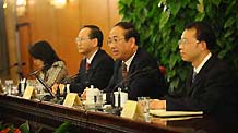 Zhao Qizheng (2nd R), spokesman of the Second Session of the 11th Chinese People's Political Consultative Conference (CPPCC) National Committee, answers questions from journalists during a news conference on the CPPCC session at the Great Hall of the People in Beijing, capital of China, on March 2, 2009.