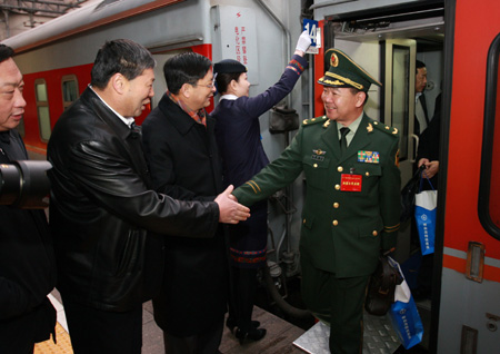 Deputies to the Second Session of the 11th National People's Congress (NPC) from central China's Henan Province arrive in Beijing, capital of China, on March 2, 2009. The Second Session of the 11th NPC is scheduled to open on March 5. 