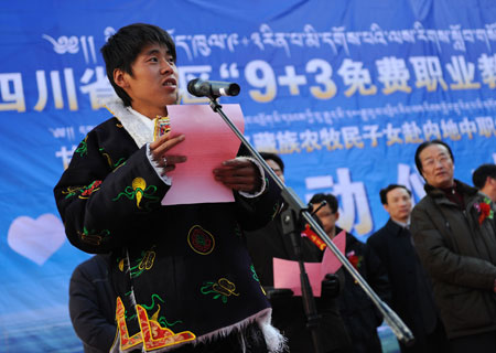 A Tibetan student from Danba addresses a gathering in Kangding County, capital of the Ganzi Tibetan Autonomous Prefecture, southwest China's Sichuan Province, on March 2, 2009. A program providing free vocational education for kids of Tibetan farmers or herdsmen was launched and 300 of them from 18 counties of the prefecture will start studying at vocational schools in more developed areas of Sichuan Province. 