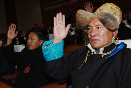 Representatives of the Tibetan ethnic group vote during an election in southwest China's Tibet Autonomous Region, on Janruary 20, 2008.