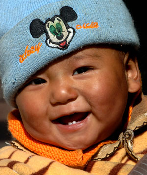 Photo taken on March 21, 2007 shows a child on the outskirts of Lhasa, capital of southwest China's Tibet Autonomous Region. 