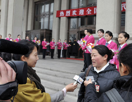 A deputy to the Second Session of the 11th National People's Congress (NPC) from Tibet is interviewed by reporters in Beijing, on March 2, 2009. The Second Session of the 11th NPC is scheduled to open on March 5. 