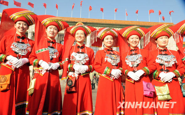 Deputies to National Committee of the 11th National People's Congress (NPC) of China arrive at Tian'anmen Square. They are in Beijing to attend the annual NPC session, which opens today. 