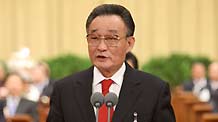 Wu Bangguo, chairman of the Standing Committee of the National People's Congress (NPC), presides over the opening meeting of the Second Session of the 11th NPC at the Great Hall of the People in Beijing, capital of China, on March 5, 2009.