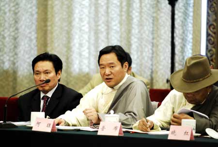 Deputies to the Second Session of the 11th National People's Congress (NPC) from southwest China's Tibet Autonomous Region deliberate the government work report in Beijing, capital of China, on March 6, 2009. 