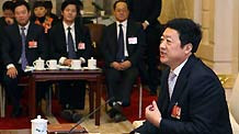 Sui Fengfu, deputy to the Second Session of the 11th National People's Congress (NPC) from northeast China's Heilongjiang Province, speaks while deliberating the government work report in Beijing, capital of China, on March 6, 2009.