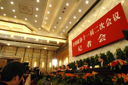 A press conference on proposals for promoting steady and relatively rapid economic growth is held by the Second Session of the 11th National Committee of the Chinese People&apos;s Political Consultative Conference (CPPCC) at the Great Hall of the People in Beijing, capital of China, on March 6, 2009. Li Yining, Li Deshui, Chen Xiwen, Wang Wenbiao and Fang Fang, members of the 11th National Committee of the CPPCC, attended the press conference.