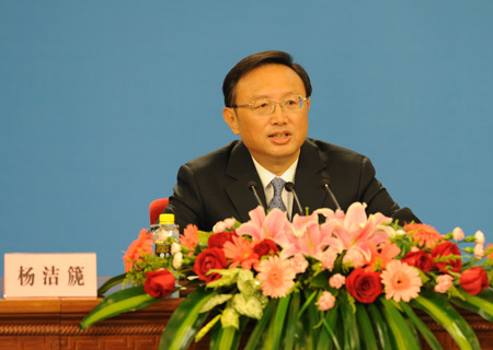 Chinese Foreign Minister Yang Jiechi speaks a the press held by the Second Session of the 11th National People&apos;s Congress (NPC) at the Great Hall of the People in Beijing, China, March 7, 2009. 