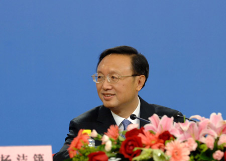 Chinese Foreign Minister Yang Jiechi smiles during a press conference held by the Second Session of the 11th National People's Congress (NPC) at the Great Hall of the People in Beijing, China, on March 7, 2009. 