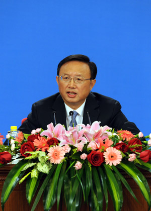 Chinese Foreign Minister Yang Jiechi answers questions during a press conference held by the Second Session of the 11th National People's Congress (NPC) at the Great Hall of the People in Beijing, China, on March 7, 2009. 