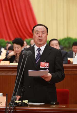 Bai Lichen, vice chairman of the National Committee of the Chinese People's Political Consultative Conference (CPPCC), presides over the third plenary meeting of the Second Session of the 11th National Committee of the CPPCC held at the Great Hall of the People in Beijing, capital of China, on March 8, 2009. 