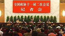 Wan Jifei, Zhou Hanmin, Cheng Yuechong, and Yang Lan, members of the 11th National Committee of the Chinese People's Political Consultative Conference (CPPCC), attend a press conference on promoting World Expo 2010 Shanghai China held by the Second Session of the 11th National Committee of the CPPCC in Beijing, capital of China, on March 8, 2009.