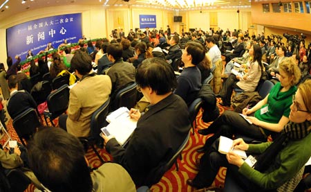 A press conference on post-earthquake reconstruction in southwest China's Sichuan Province, is held by the Second Session of the 11th National People's Congress (NPC) in Beijing, capital of China, on March 8, 2009.