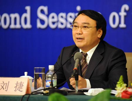 Liu Jie, director of the provincial development and reform commission of Sichuan Province, answers questions during a press conference on post-earthquake reconstruction in southwest China's Sichuan Province, held by the Second Session of the 11th National People's Congress (NPC) in Beijing, capital of China, on March 8, 2009. 
