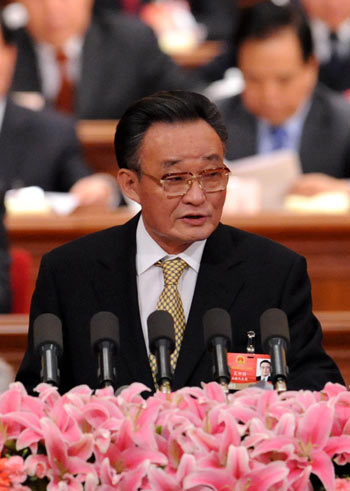 Wu Bangguo, chairman of the Standing Committee of the National People's Congress (NPC), delivers a report on the work of the NPC Standing Committee during the second plenary meeting of the Second Session of the 11th NPC at the Great Hall of the People in Beijing, capital of China, on March 9, 2009. 