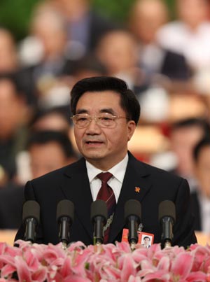 Wang Xiaoxun, member of the 11th National Committee of the Chinese People's Political Consultative Conference (CPPCC), speaks at the fourth plenary meeting of the Second Session of the 11th National Committee of the CPPCC held at the Great Hall of the People in Beijing, capital of China, on March 9, 2009.