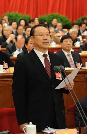 Du Qinglin, vice chairman of the National Committee of the Chinese People's Political Consultative Conference (CPPCC), presides over the fourth plenary meeting of the Second Session of the 11th National Committee of the CPPCC held at the Great Hall of the People in Beijing, capital of China, on March 9, 2009. 