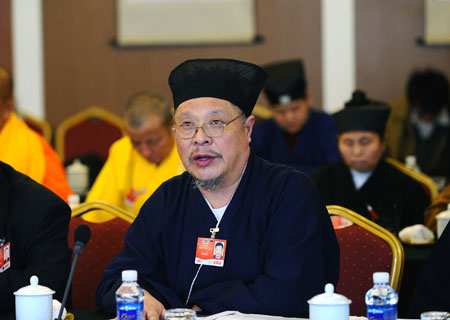  Liu Huaiyuan, member of the 11th National Committee of the Chinese People's Political Consultative Conference (CPPCC) from the religious circle, speaks during a panel discussion in Beijing, capital of China, March 10, 2009.