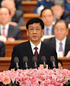 China's Prosecutor-General Cao Jianming delivers a report on the work of the Supreme People's Procuratorate during the third plenary meeting of the Second Session of the 11th National People's Congress (NPC) at the Great Hall of the People in Beijing, capital of China, on March 10, 2009. 