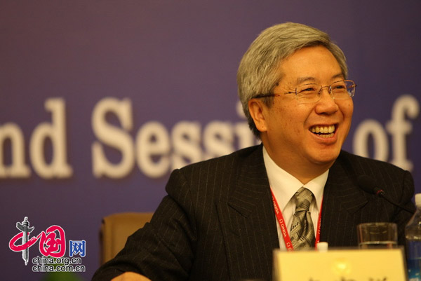 Li Jiaxiang, member of the 11th National Committee of the Chinese People's Political Consultative Conference (CPPCC), answers questions during a press conference on 'Coping with the Global Financial Crisis' in Beijing, capital of Chian, on March 10, 2009.