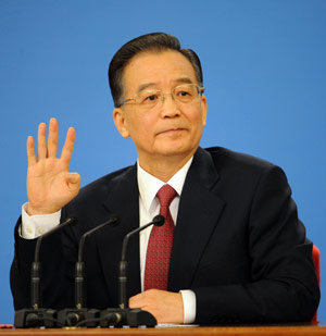 Chinese Premier Wen Jiabao answers questions during a press conference after the closing meeting of the Second Session of the 11th National People&apos;s Congress (NPC) at the Great Hall of the People in Beijing, capital of China, on March 13, 2009. The annual NPC session closed on Friday. 