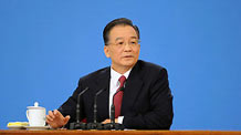 Chinese Premier Wen Jiabao answers questions during a press conference after the closing meeting of the Second Session of the 11th National People's Congress (NPC) at the Great Hall of the People in Beijing, capital of China, on March 13, 2009. The annual NPC session closed on Friday.