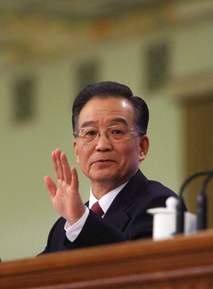 Chinese Premier Wen Jiabao answers questions during a press conference after the closing meeting of the Second Session of the 11th National People's Congress (NPC) at the Great Hall of the People in Beijing, capital of China, on March 13, 2009. The annual NPC session closed on Friday. 