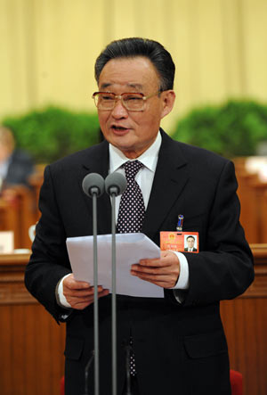 Wu Bangguo, chairman of the Standing Committee of the National People's Congress (NPC), presides over the closing meeting of the Second Session of the 11th NPC at the Great Hall of the People in Beijing, capital of China, on March 13, 2009. 