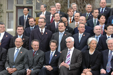 Finance ministers and central bank governers pose for group photos at a hotel near Horsham, southern England, on March 14, 2009. The G20 Finance Ministers' Meeting kicked off on Saturday. 