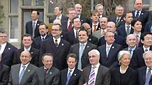 Finance ministers and central bank governers pose for group photos at a hotel near Horsham, southern England, on March 14, 2009. The G20 Finance Ministers' Meeting kicked off on Saturday.