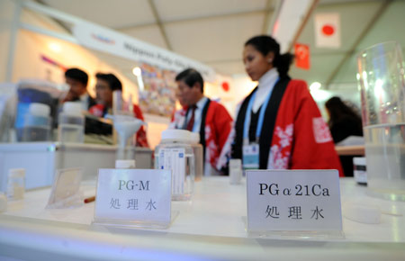 Exhibitors demonstrate water treatment experiment at the Japanese stand during a water exhibition of the Fifth World Water Forum in Istanbul of Turkey, on March 18, 2009. A record of 28,000 participants from all over the world are gathering in the forum kicked off Monday in the biggest Turkish city of Istanbul, organized every three years by the World Water Council together with the host country, to promote ideas about conserving, managing and supplying water.